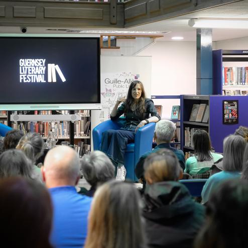 Author Claire Kilroy addresses the audience in the Guille-Allès Library at the 2024 Guernsey Literary Festival.